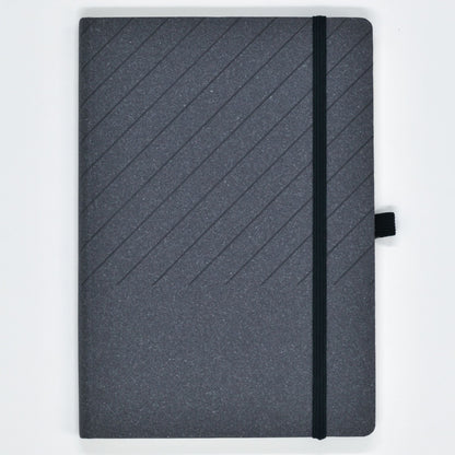 Gray notebook with a black strap on a light gray background