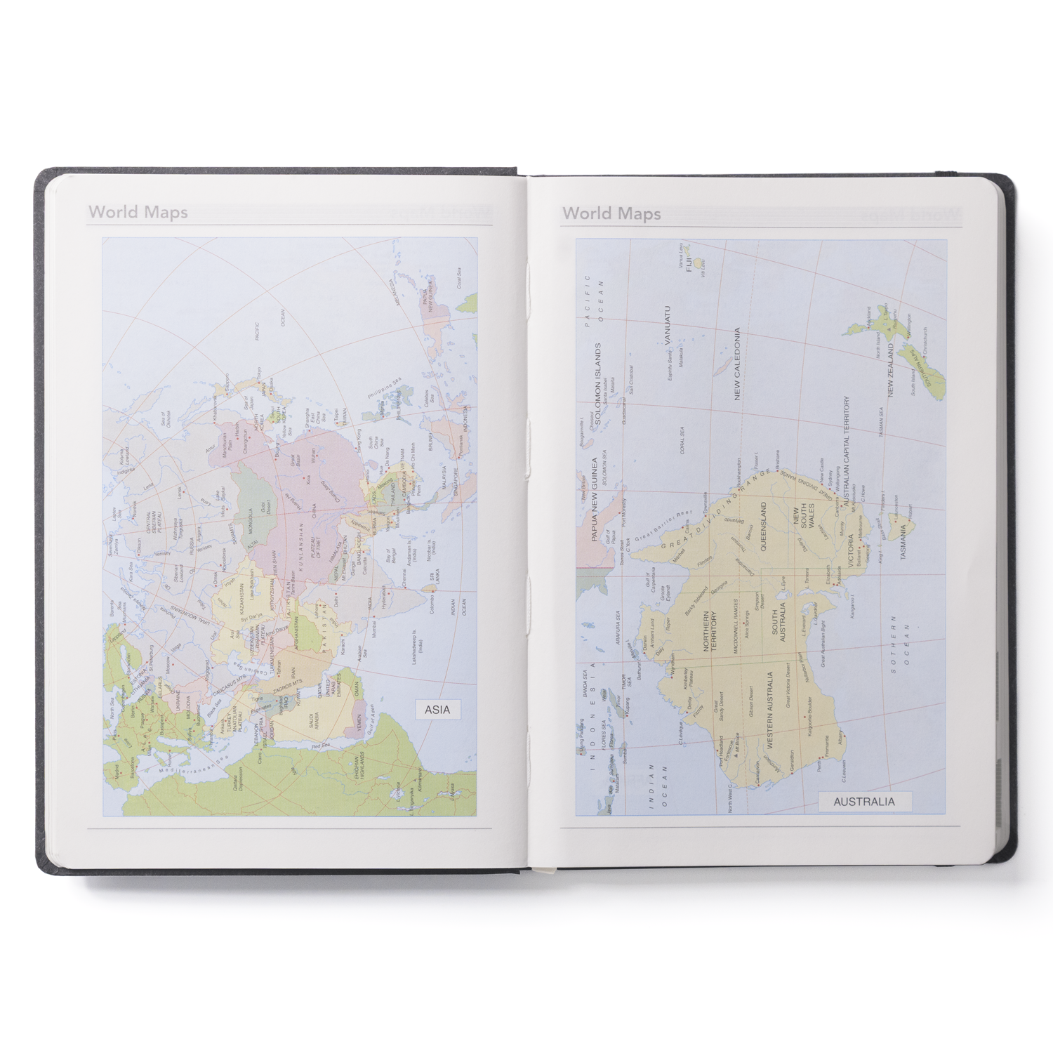 Open book with world map on a white background