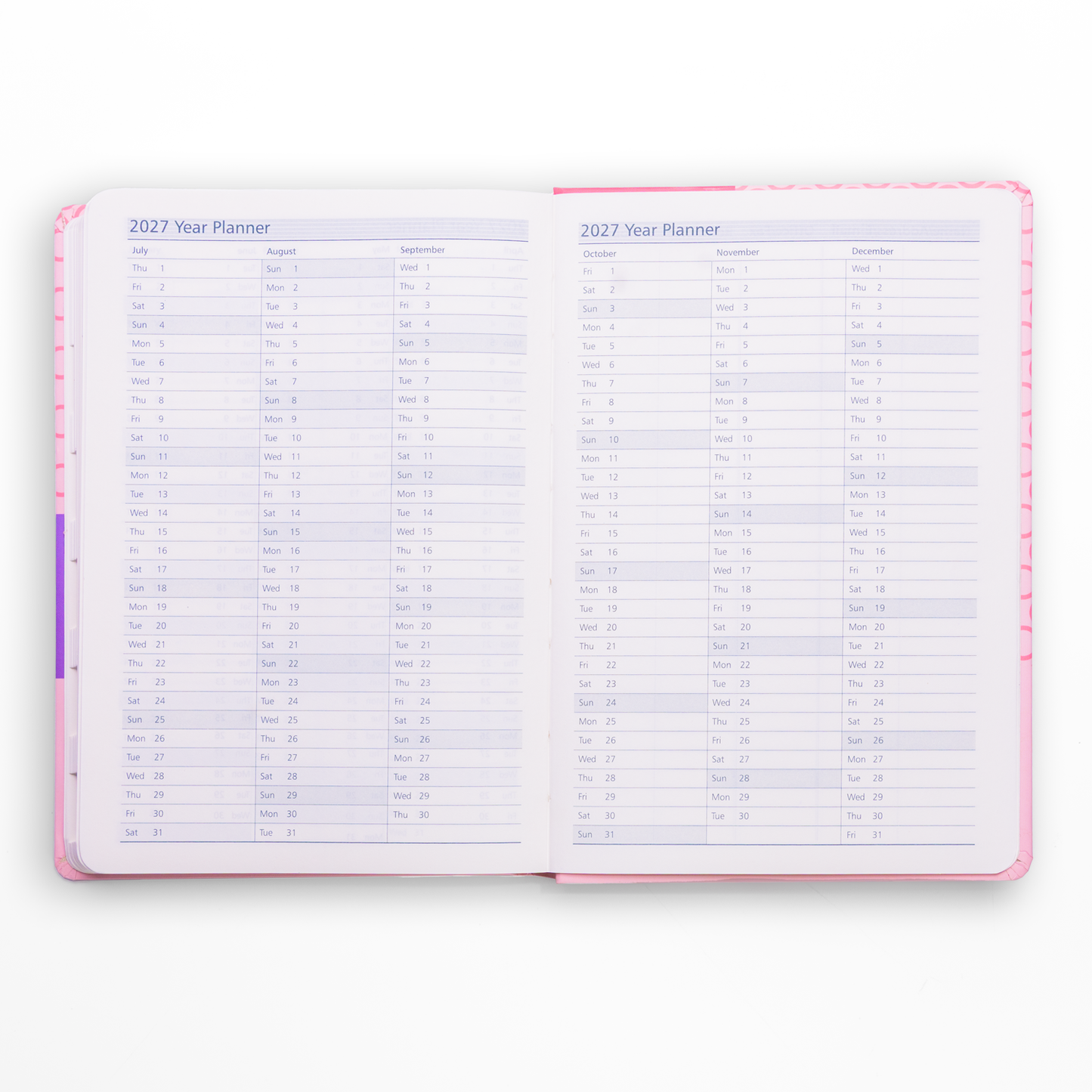 Open year planner with a pink cover on a white background