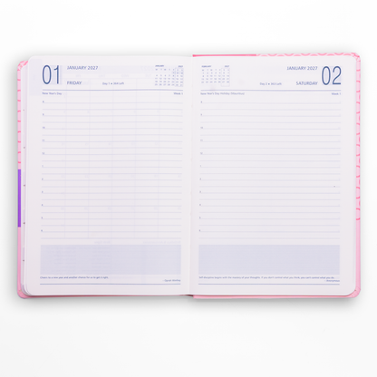 Open planner showing two pages with calendar and notes sections on a white background
