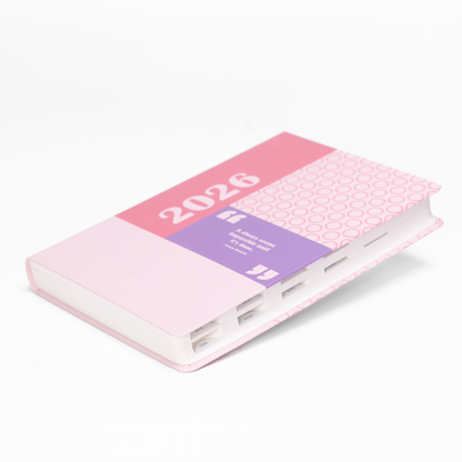 2026 planner with a pink and white design on a white background