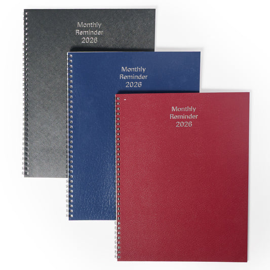 Three spiral-bound planners in gray, blue, and red with 'Monthly Reminder 2026' text on a white background.