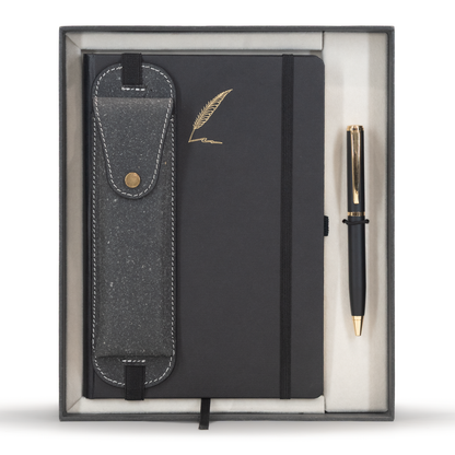 Black notebook with a pen and pouch in a box on a white background