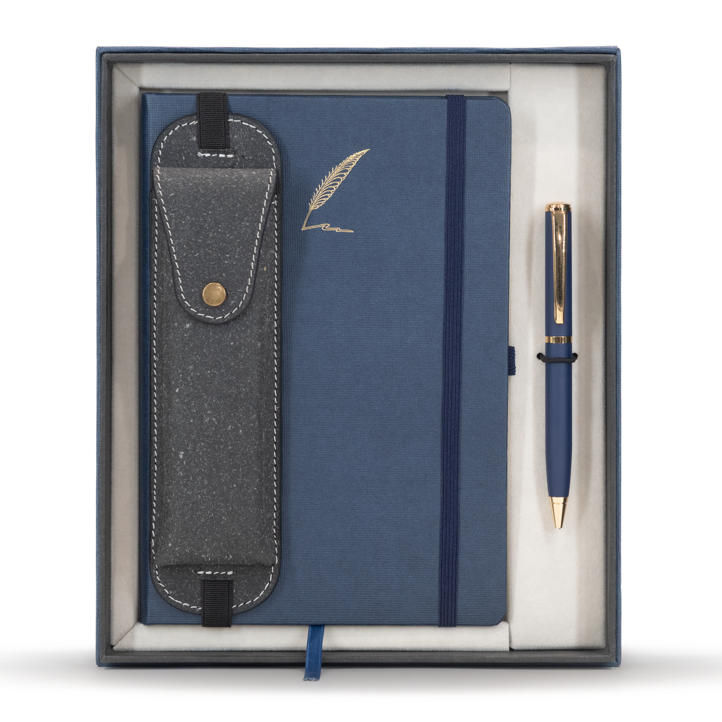 Navy blue notebook with pen and luggage tag in a box