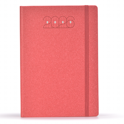 Red notebook with '2026' printed on the cover against a white background